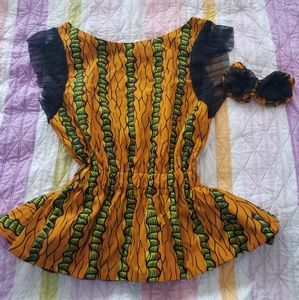 Beautiful African print peplum blouse and earrings